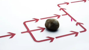 Führungskompetenz stärken: Symbolbild mit Stein als Stolperstein im Führungsweg.